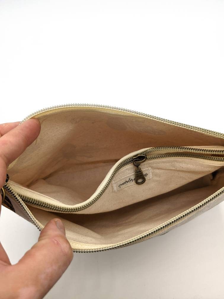 Double zip leather clutch bag